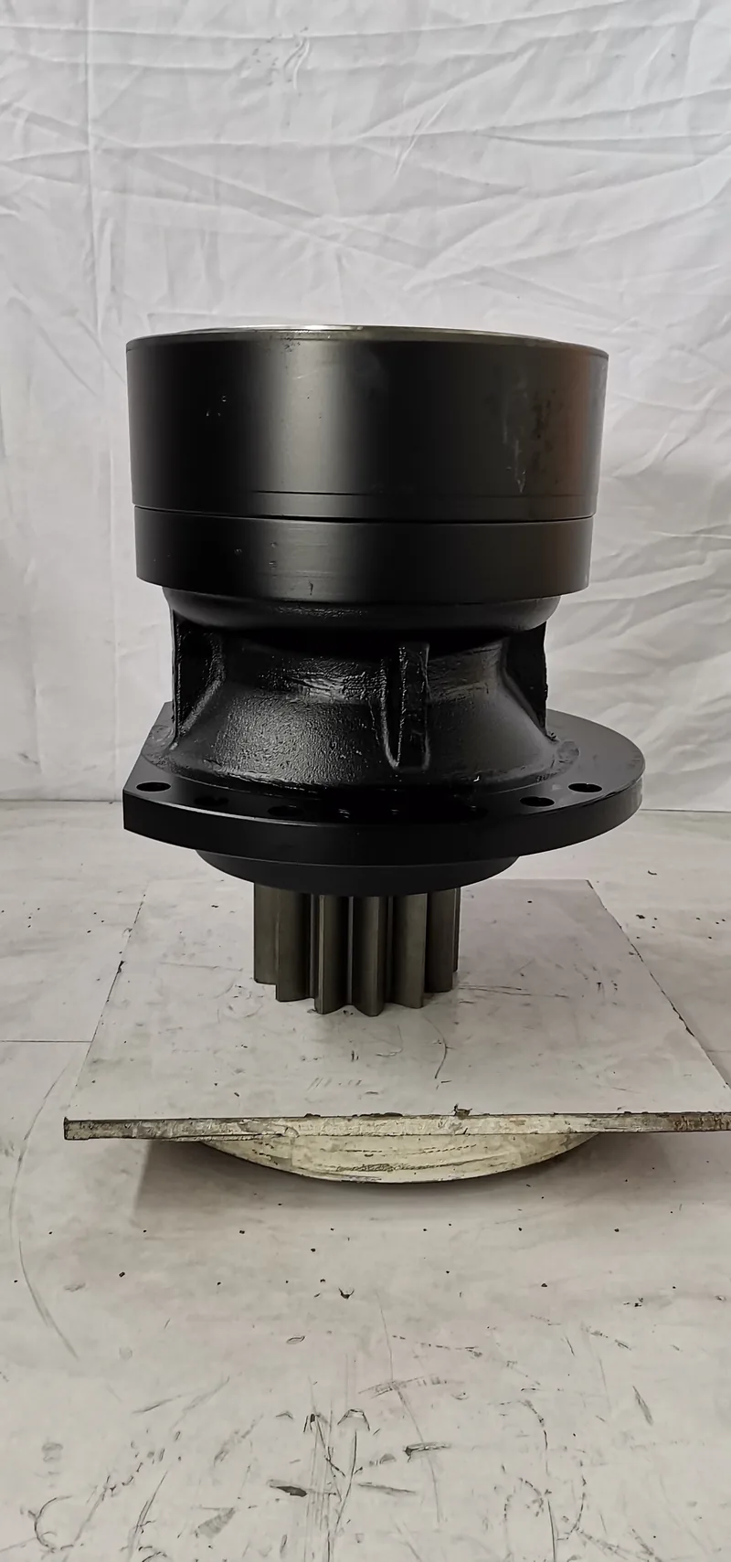 Black excavator swing reduction gearbox with output pinion