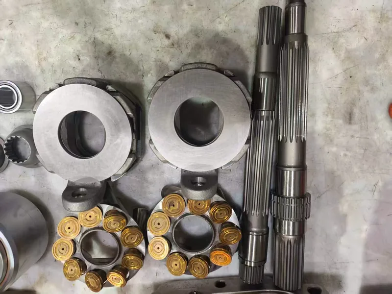 Hydraulic pump shafts, rotary groups and components arranged for inspection