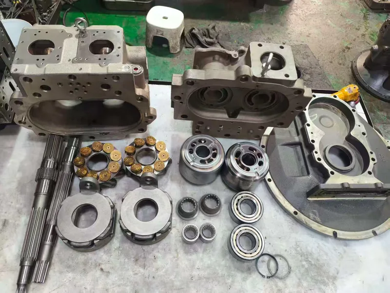 Hydraulic pump spare parts arranged for inspection