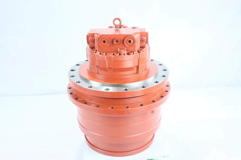 Red travel motor and final drive assembly on a white background