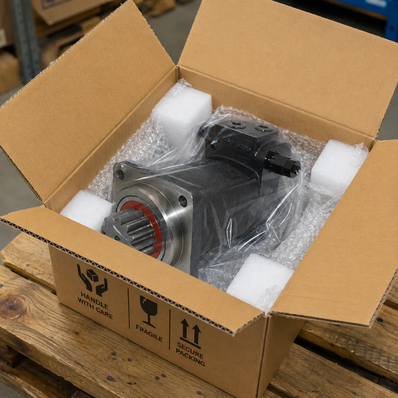 Swing motors strapped on a shipping pallet